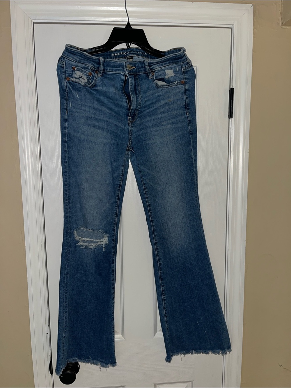 American Eagle Outfitters Medium Blue Flared Distressed Jeans